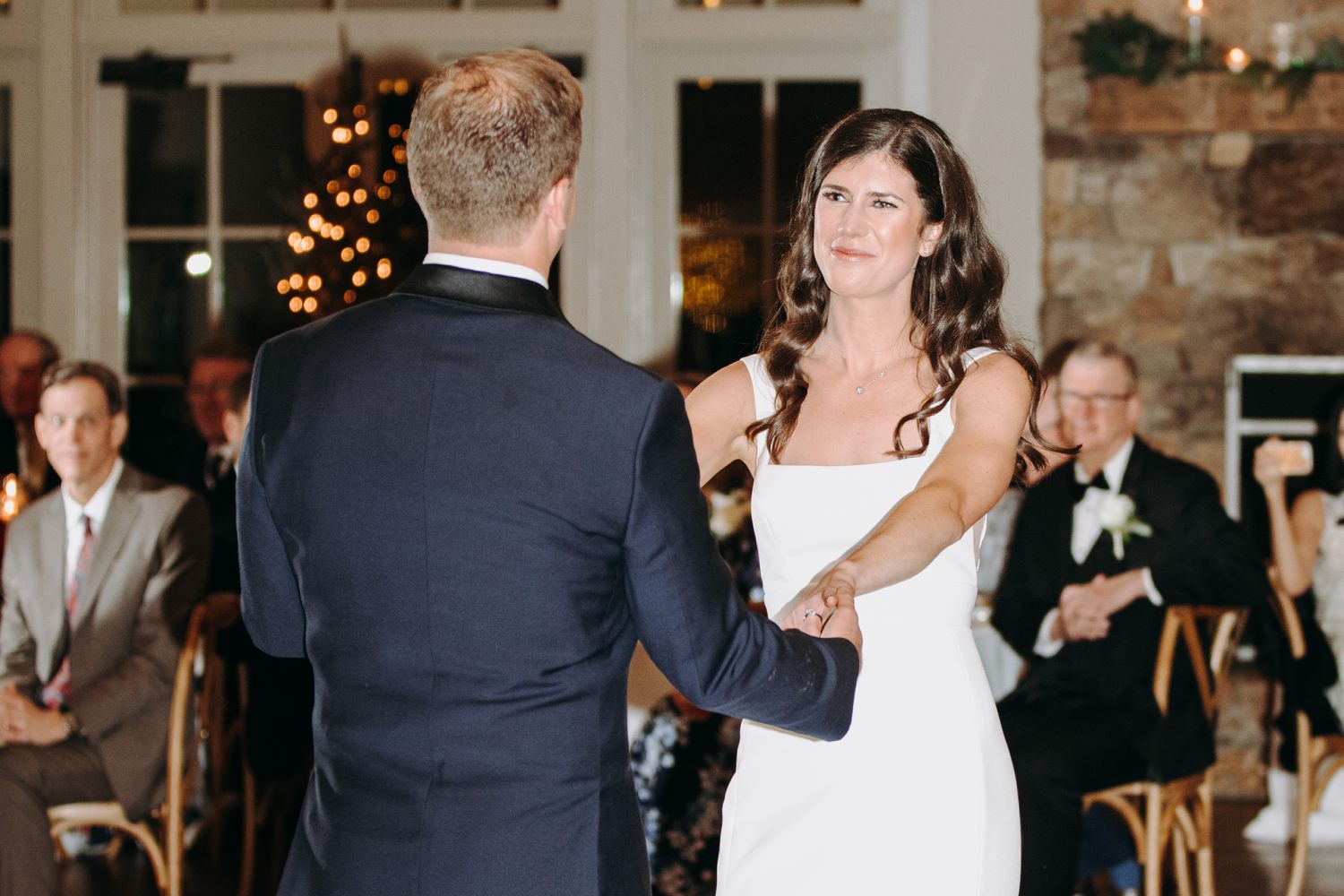 bride looking at groom