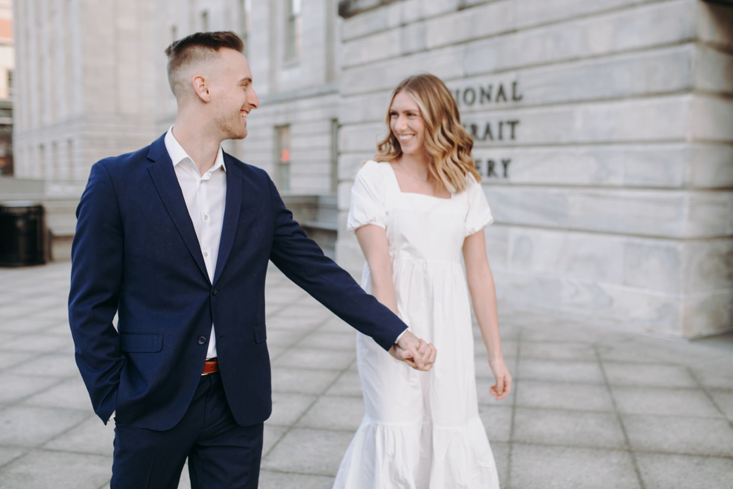 national portrait gallery engagement swinging hands blurry