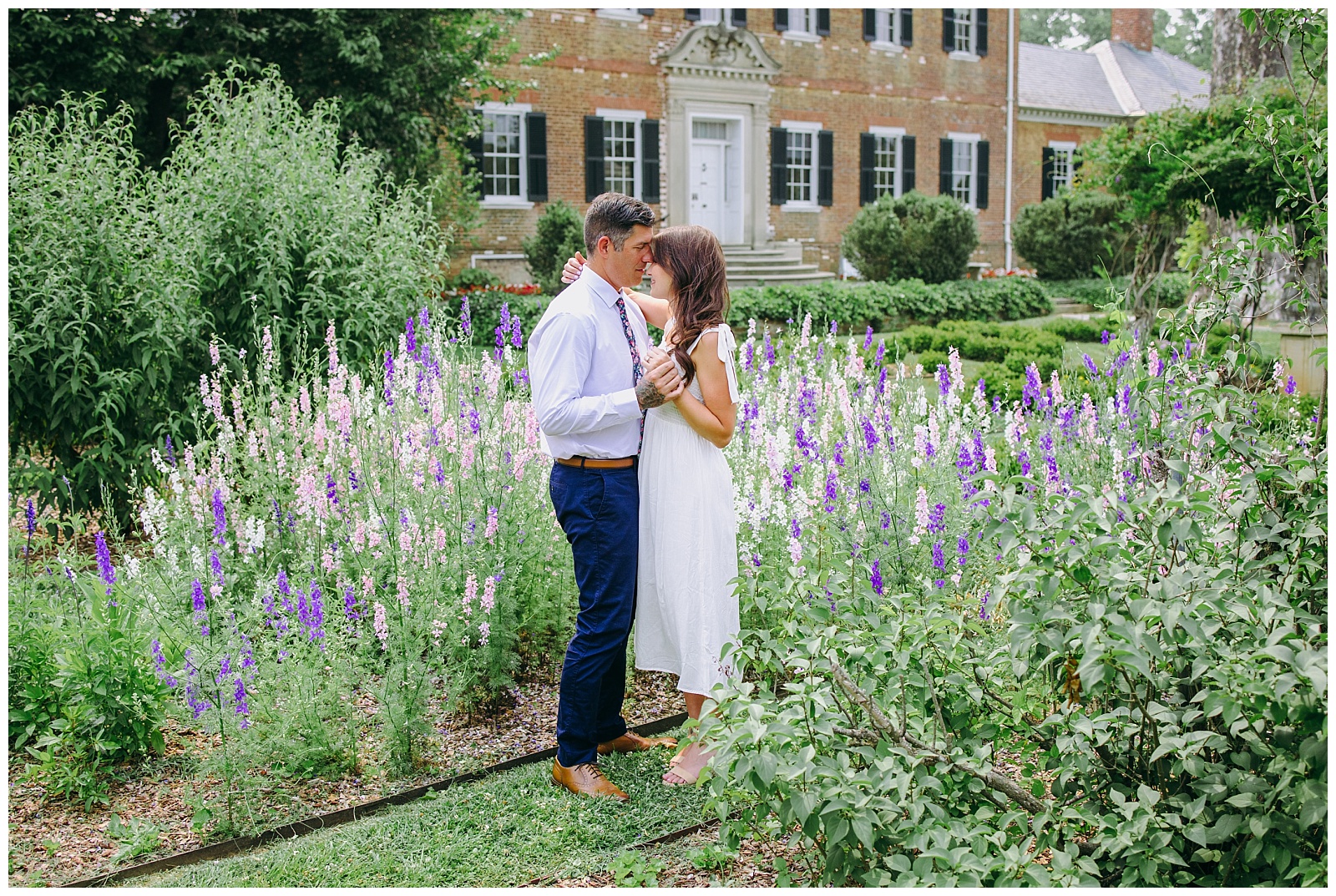 engaged couple holding each other